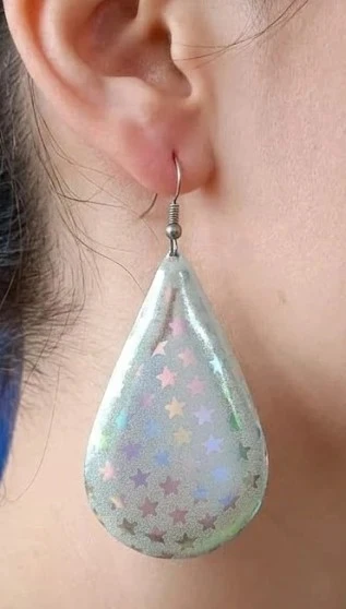 Boucle d oreille argenté en forme de goutte avec étoile neuve